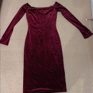 Red velvet off the shoulder dress.